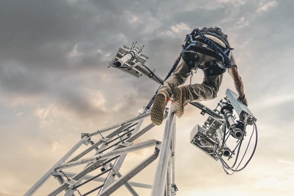 FallTech climber and harness on tower